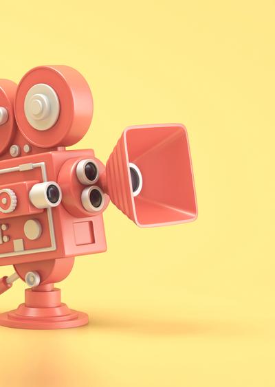 Red movie camera on yellow background.